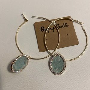 Large gold hoops with upcycle charms.